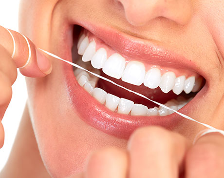 beautiful smile women flossing