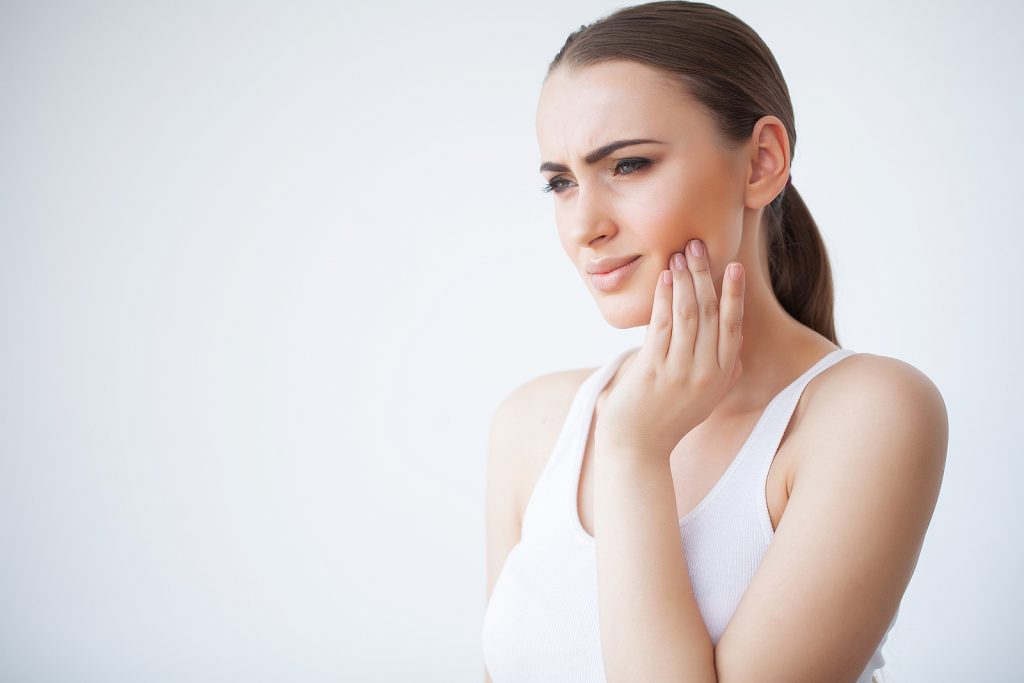 woman with tooth pain