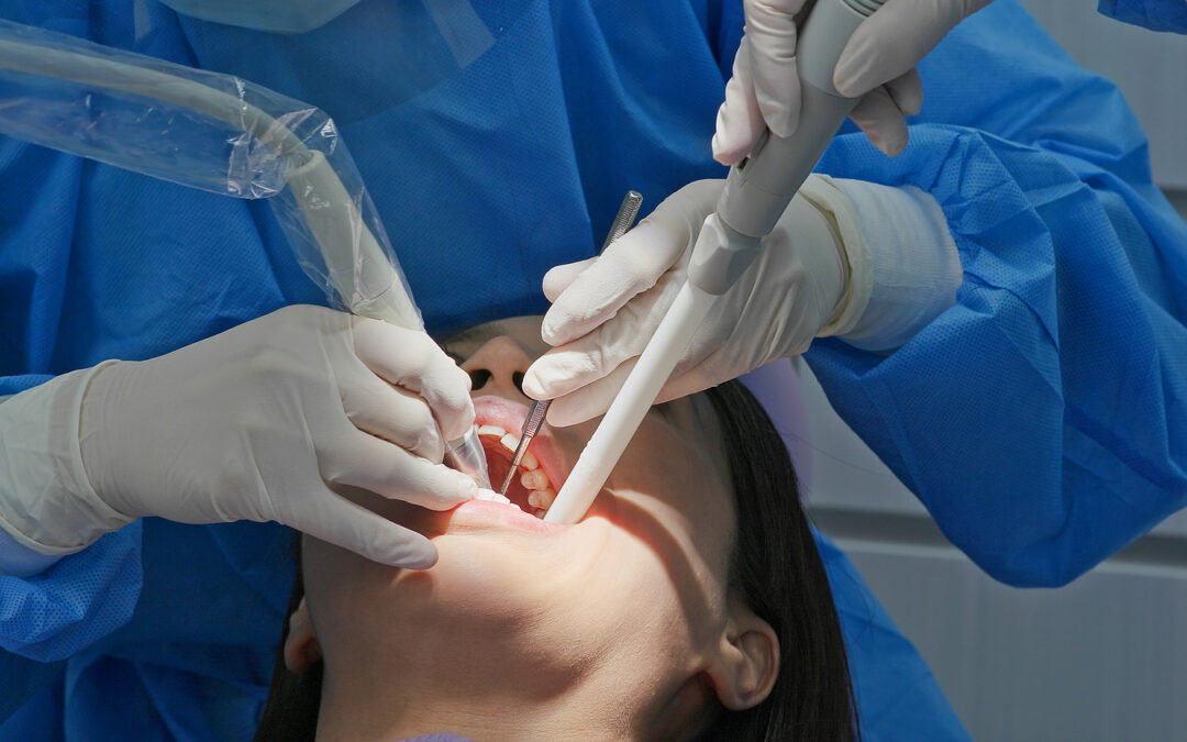 photo of a woman undergoing dental scaling